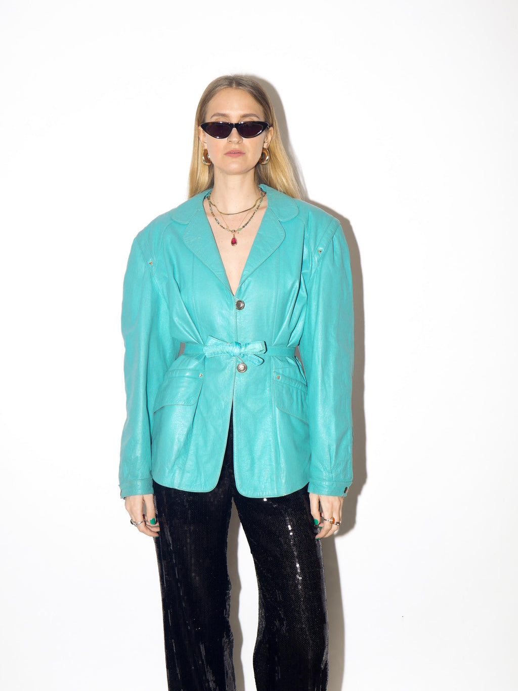 VINTAGE blue leather jacket from 1980s with belt and big shoulder pads by Clan®
