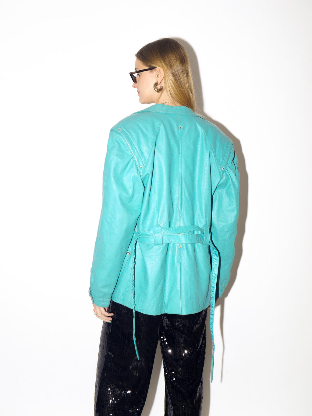 VINTAGE blue leather jacket from 1980s with belt and big shoulder pads by Clan®