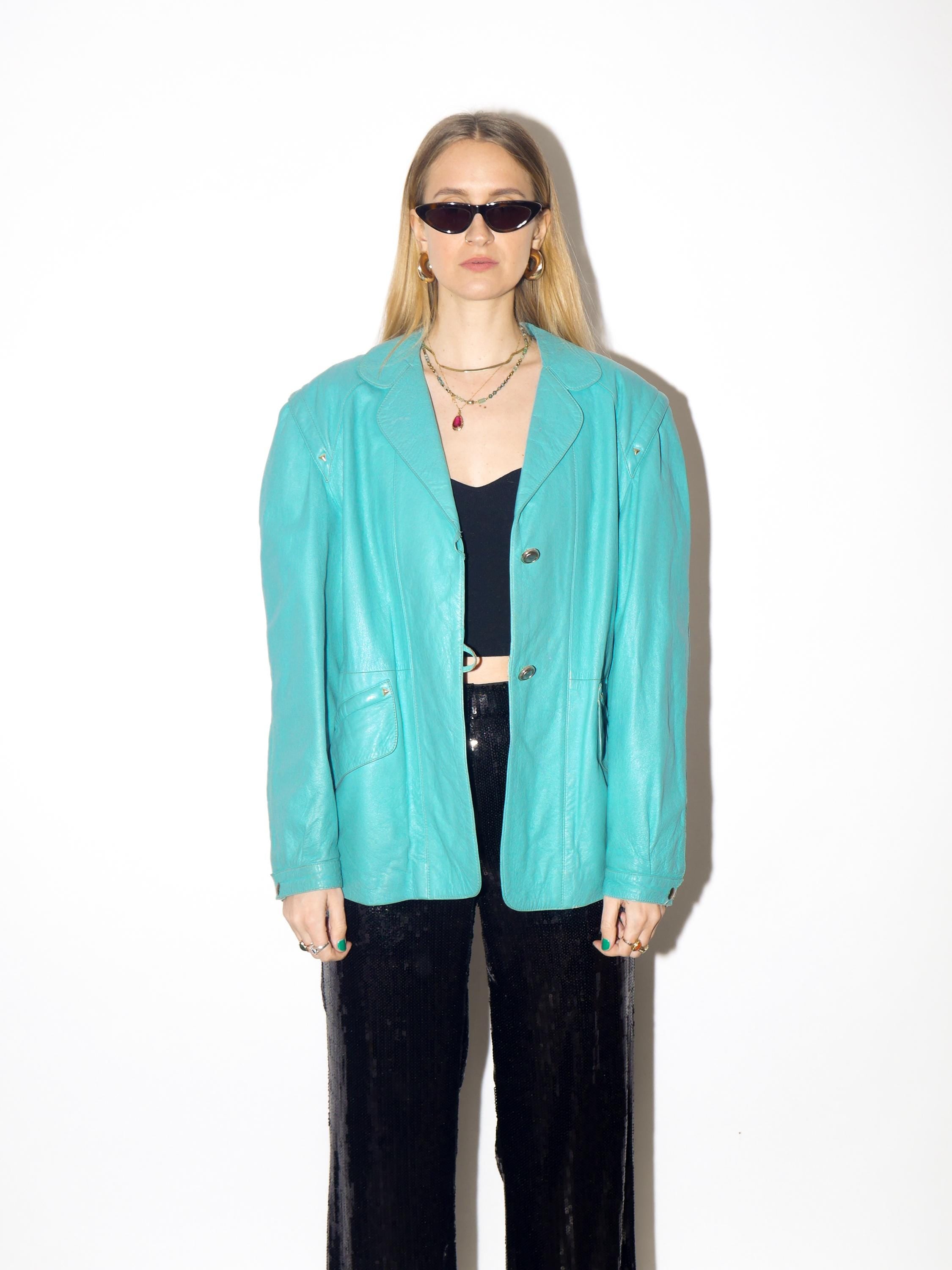 VINTAGE blue leather jacket from 1980s with belt and big shoulder pads by Clan®