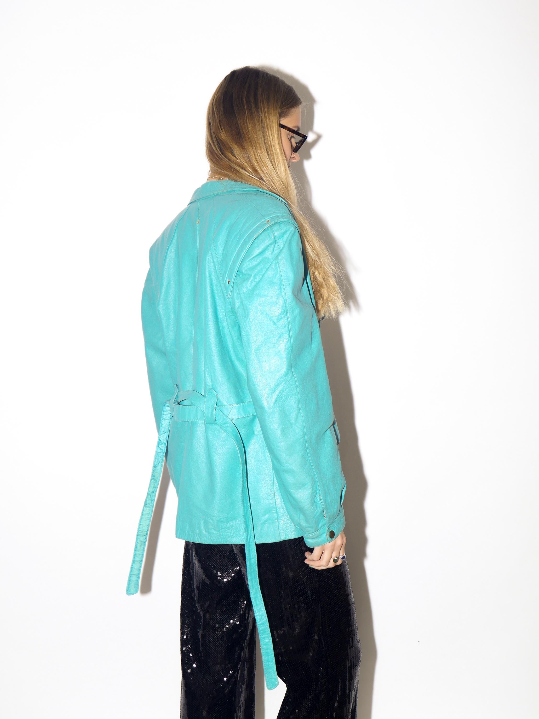 VINTAGE blue leather jacket from 1980s with belt and big shoulder pads by Clan®