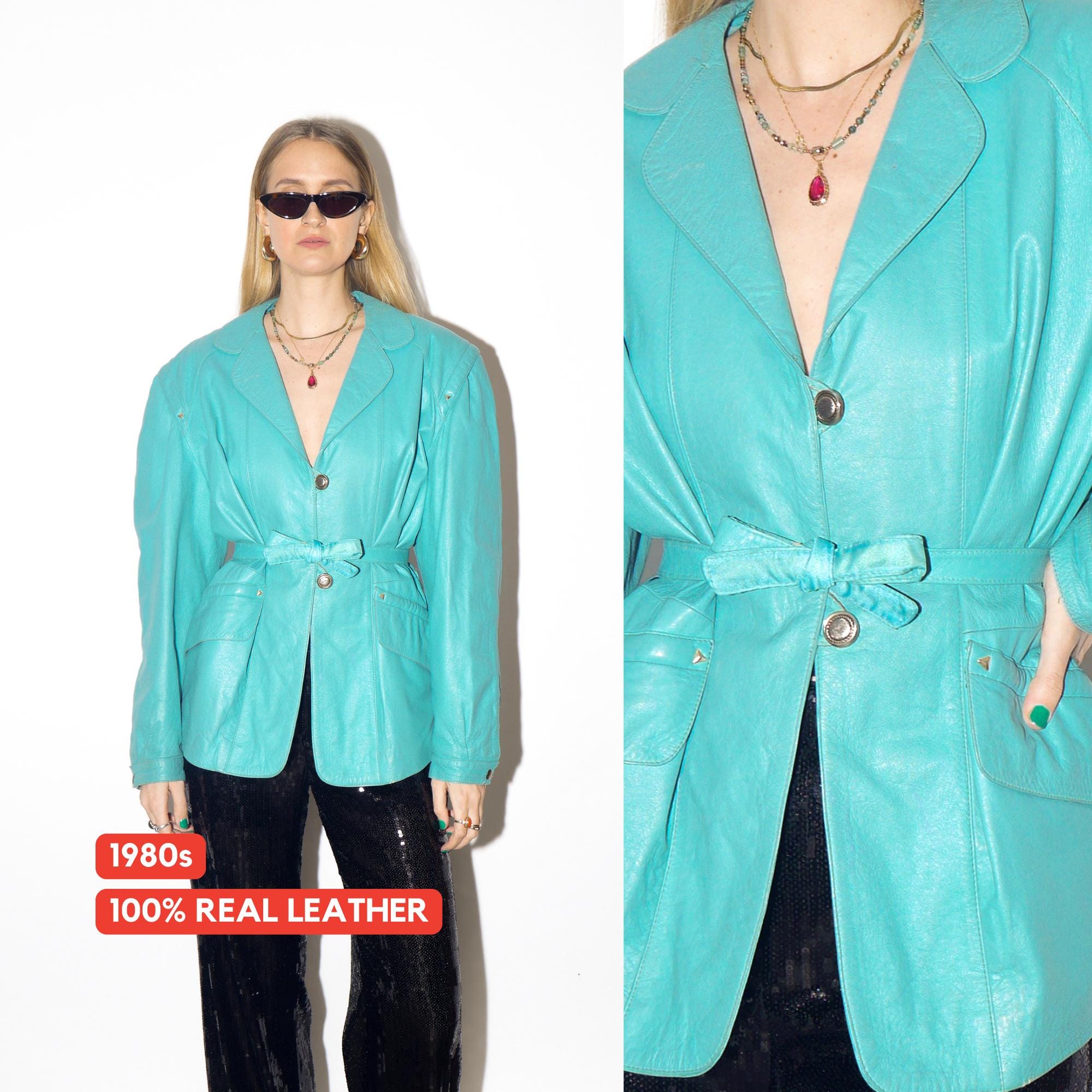 VINTAGE blue leather jacket from 1980s with belt and big shoulder pads by Clan®