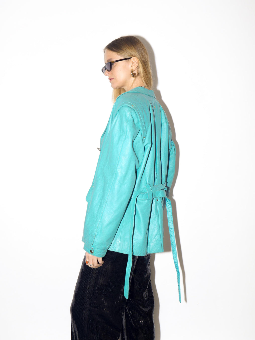 VINTAGE blue leather jacket from 1980s with belt and big shoulder pads by Clan®