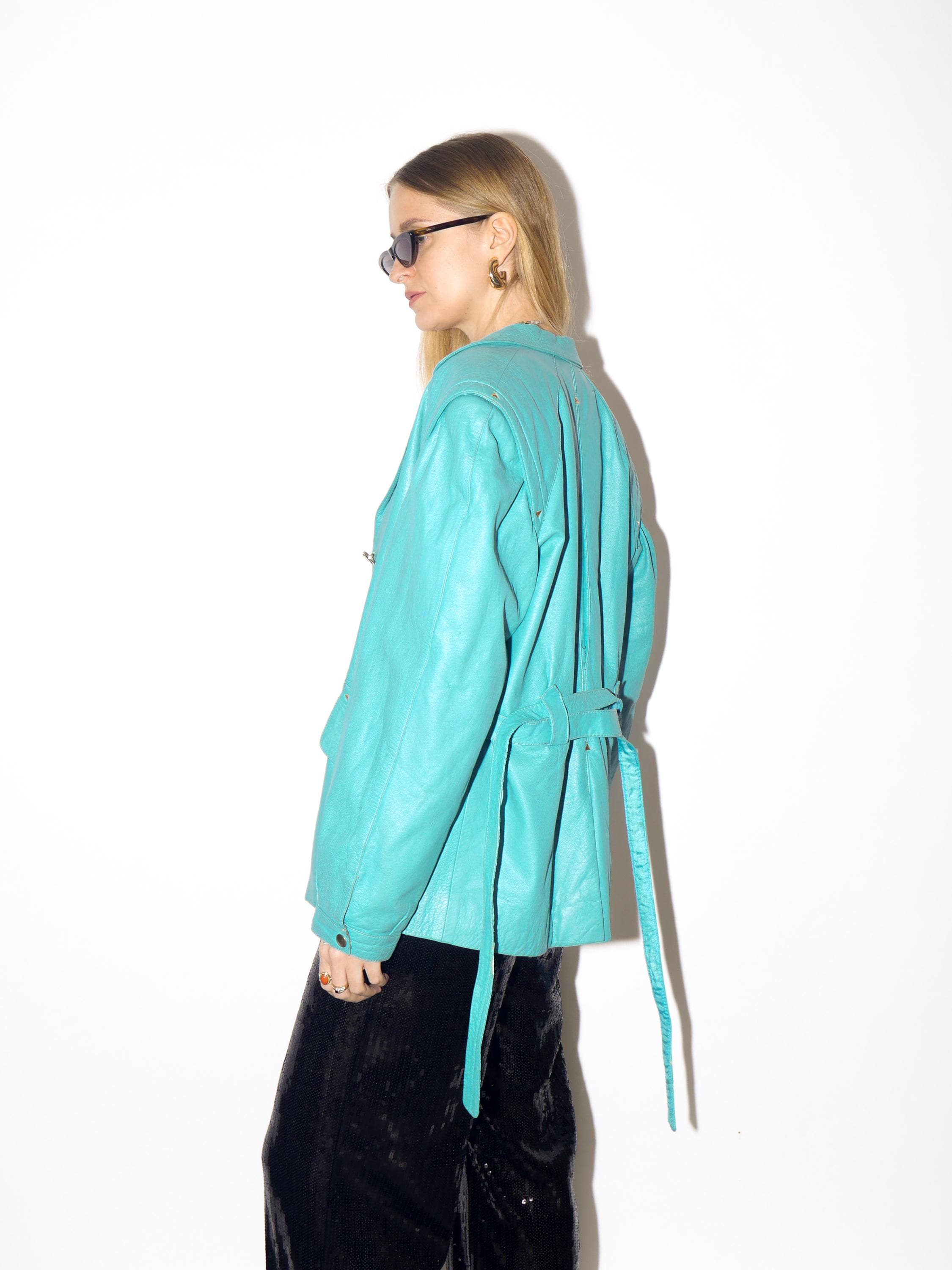 VINTAGE blue leather jacket from 1980s with belt and big shoulder pads by Clan®
