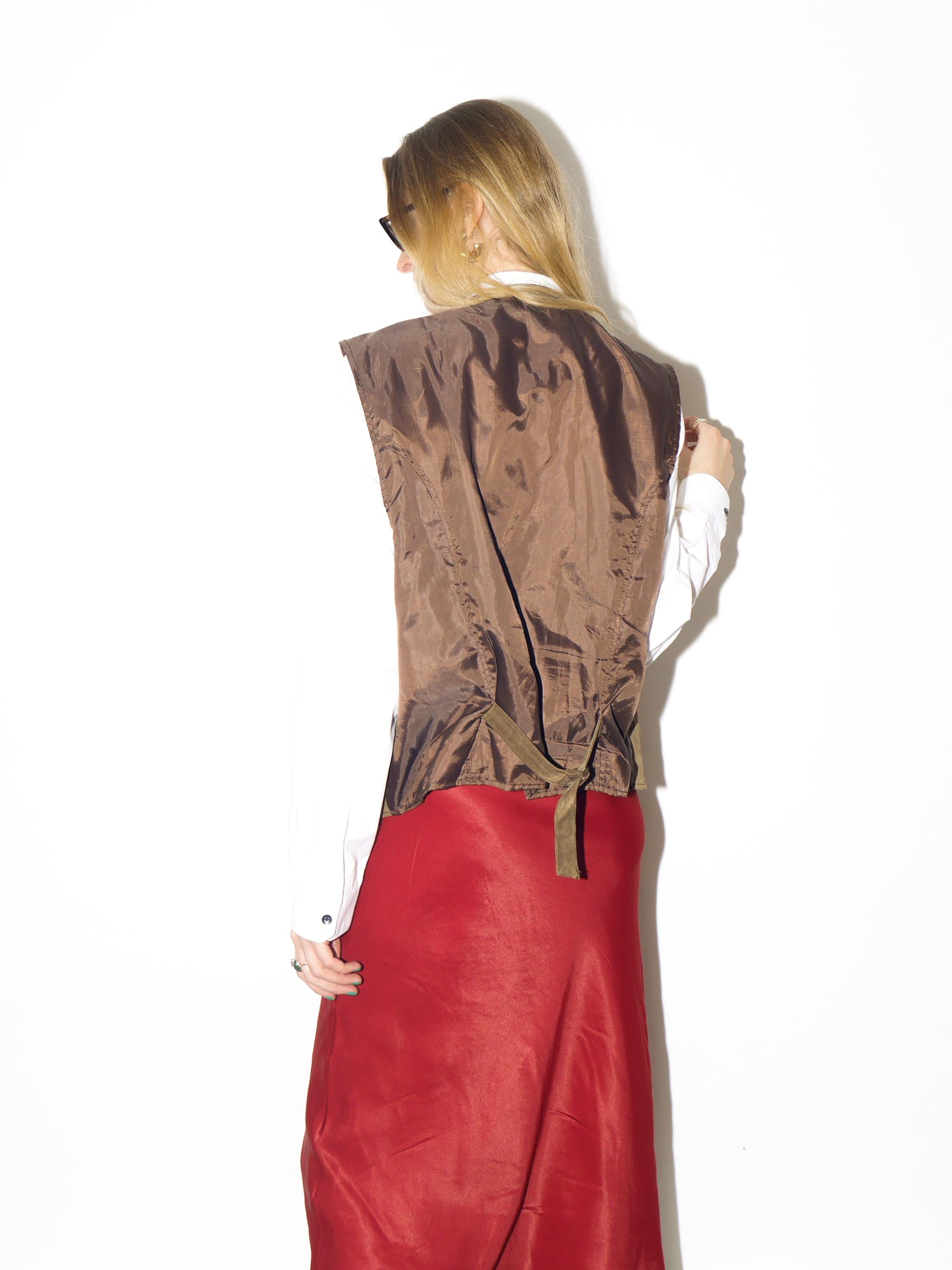 VINTAGE bronze suede vest from 1990s in light brown leather in oversize fit